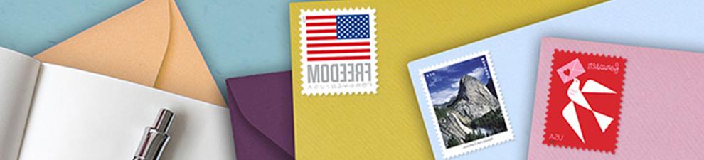 Assortment of colored envelopes with the Love, Waterfalls, and U.S. Flag 一流的邮件 Forever stamps.